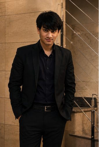 Dushyant Bhardwaj in a black suit