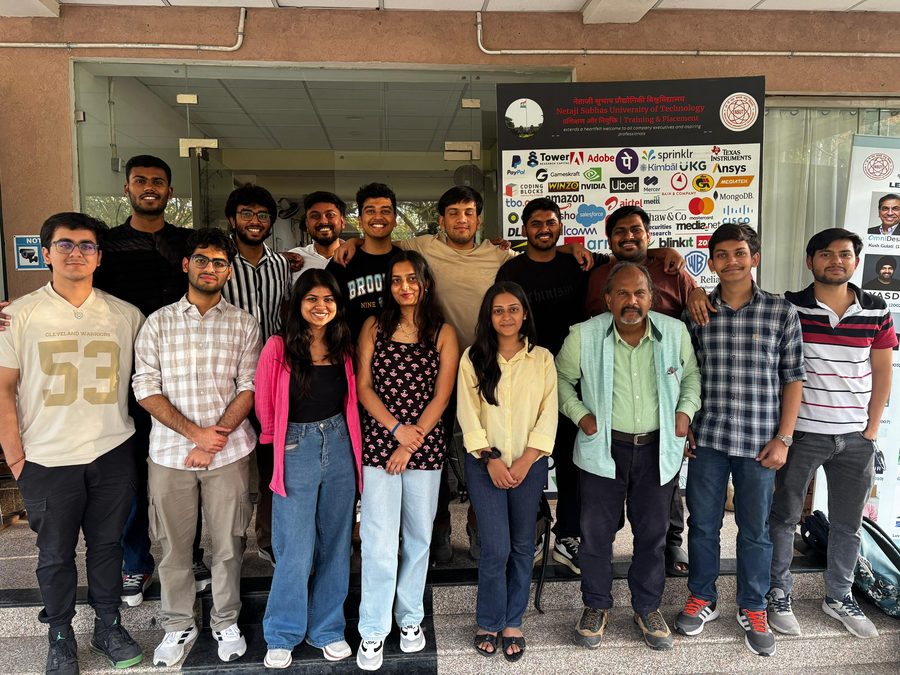 The Training and Placement Cell team outside the NSUT placement office, in front of a board of recruiter logos
