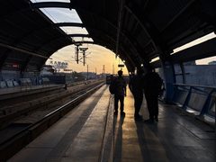 A railway platform at sunset